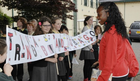 Pupils from St Helen’s Primary School welcoming Trinidad and Tobago triple jumper Ayanna Alexander to the Vale of Glamorgan.